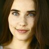 Alix Angelis as Sara