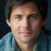 Kristoffer Polaha as Detective Travis Burke