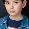 Benjamin Jacobson as John (voice)