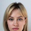 Elena Bushueva as Employee