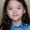 Emma Ho as Ruth (13 Years Old)