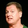 Ian Roberts as John Traherne