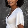 Natalie Simpson as DC Lawson