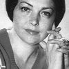 Tamara Sovchi as barmaid (uncredited)