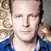 Nicholas Facey as John