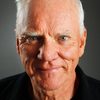 Malcolm McDowell as Trench coat