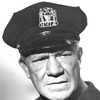 Frank Moran as The Boss' Chauffeur