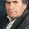 Serge Marquand as Larry Rogers
