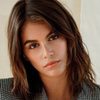 Kaia Gerber as Oksana