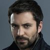 Rhys Coiro as John