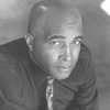 David Downing as 'Dark Town' Singer