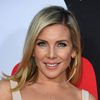 June Diane Raphael as Donna
