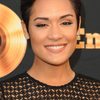 Grace Byers as Kate