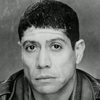 Kamel Krifa as Mah Jong Manager