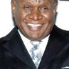 George Wallace as Grave Digger