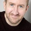 Craig Heaney as Phil