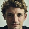 Niels Schneider as Alain Aubert