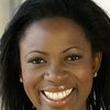 Sope Aluko as Dr. Collins
