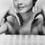 Neile Adams as Saleswoman
