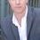 David Lewis as Suit #1