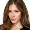 Jordan Claire Robbins as Zoe