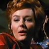 Dominique Badou as Sonny's girl in red