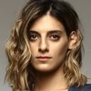 Hristina Heila-Fameli as Estrea Beza