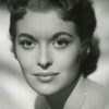 Eileen Moore as Mrs. Holland