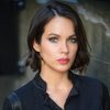 Aria DeMaris as Eva Martinez