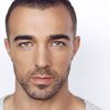 Sam Upton as Phillip Morrison