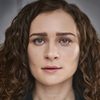 Emily Tucker as Nina