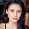 Emily Shah as Roshni Thakkar