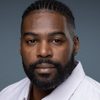 Sheldon Bailey as Tom