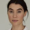 Meda Andreea Victor as Woman Filing Teeth