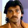 Mahesh Anand as Man collecting money from the poor