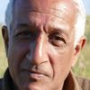 Khalid Tyabji as Biki