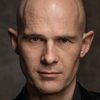 Andrew Byron as Tolstoy