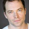 Brad Hodder as Eric Carrinton