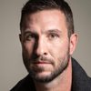Pablo Schreiber as Conrad (Older)