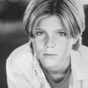 Alex Black as Young Chris Grandy