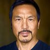 Darryl Chan as Tommy Loy