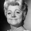 Hermione Baddeley as Mrs. Worth