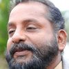 Nandu Poduval as Man in the Tea Shop