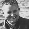 Teddy Tucker as The Harbor Master