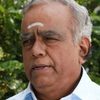 Pyramid Natarajan as Varadharajan