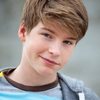 Levi Miller as Erik Wolff