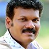 Vinod Kedamangalam as Textile Shop Salesman