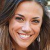 Jana Kramer as April