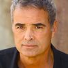 Mark Brandon as Night Anchor Bret Anderson