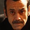 Nicola Rignanese as Ernesto 'o Posteggiatore
